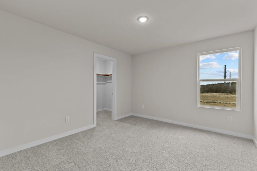 A room with a painting on the wall. A room with a painting on the wall.