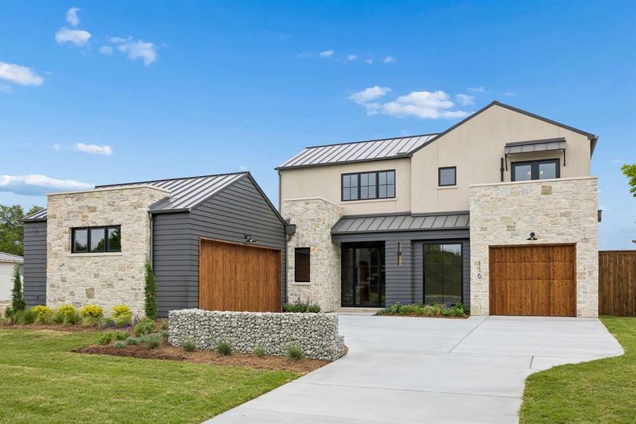 Front exterior of a new home in , Coppell, TX, highlighting curb appeal (Image 1). Front exterior of a new home in , Coppell, TX, highlighting curb appeal (Image 1).
