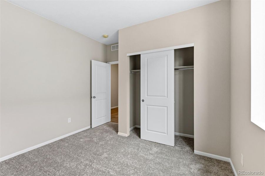 Spacious, unfurnished interior of a new home in The Cottages Collection at Ridgeline Vista, Brighton (Image 22).