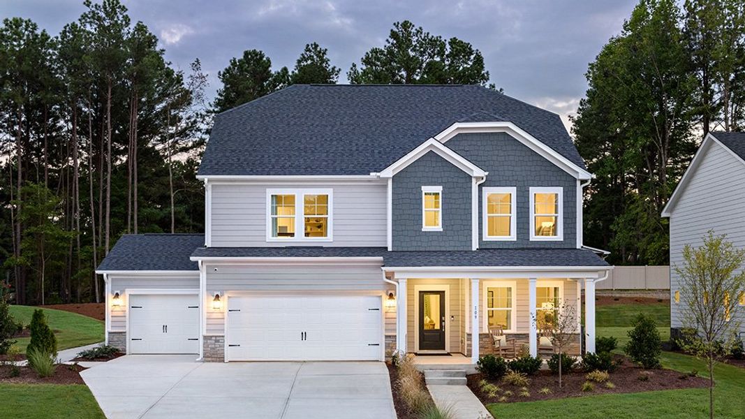 Front exterior of a new home in Eagle Trace, Wendell, NC, highlighting curb appeal (Image 2). Front exterior of a new home in Eagle Trace, Wendell, NC, highlighting curb appeal (Image 2).
