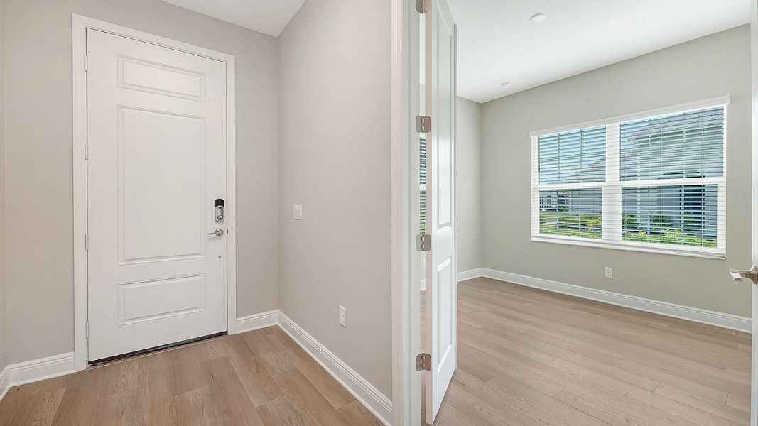 Spacious, unfurnished interior of a new home in Wildleaf Real Estate and Homes for Sale in Parrish, FL - Neal Communities, Parrish (Image 25).