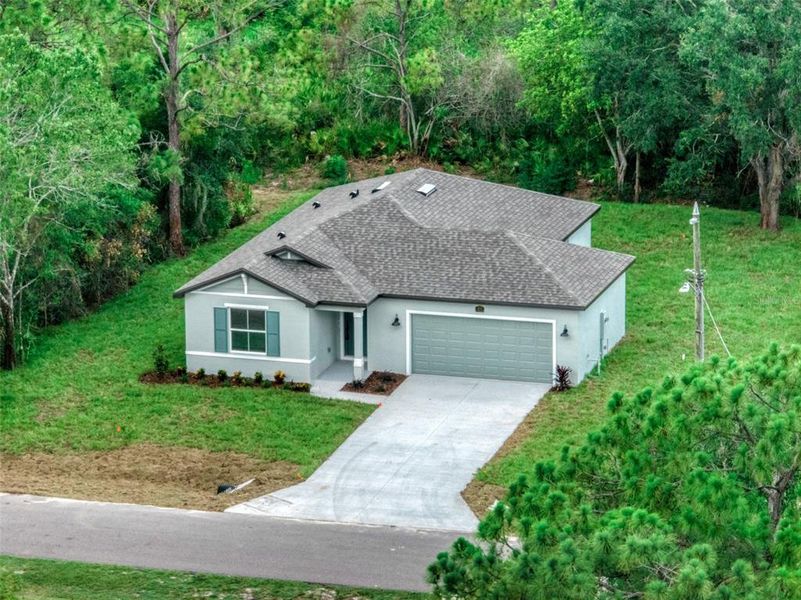 Front exterior of a new home in , Sebring, FL, highlighting curb appeal (Image 29).