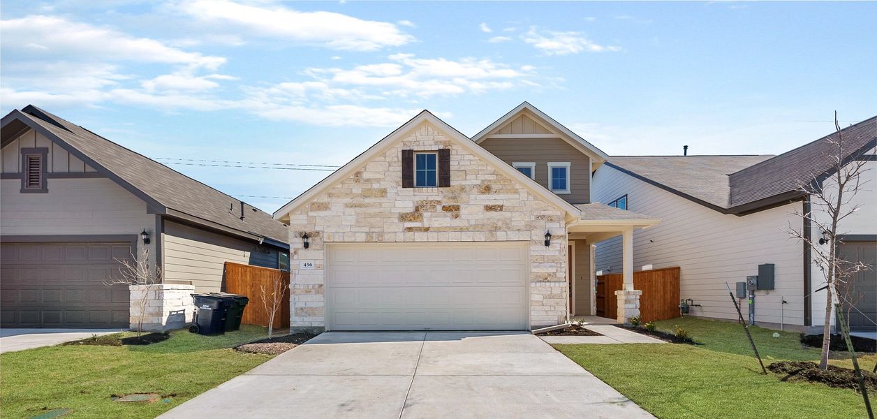 Representative exterior photo of a completed home built from the Ladybird by Ashton Woods in The Trails at Carmel 40s, Pflugerville, TX (Image 21).