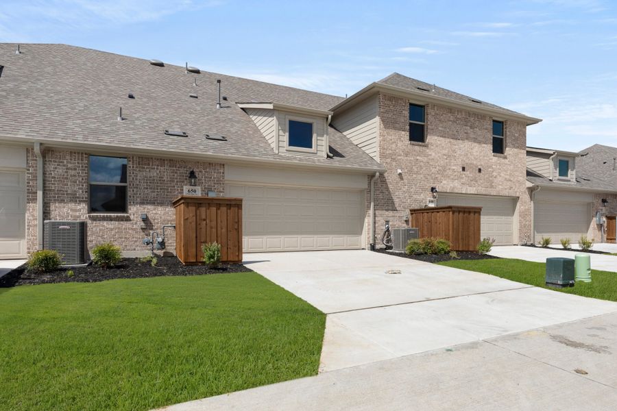 Front exterior of a new home in Woodbridge Villas, Wylie, TX, highlighting curb appeal (Image 19). Front exterior of a new home in Woodbridge Villas, Wylie, TX, highlighting curb appeal (Image 19).