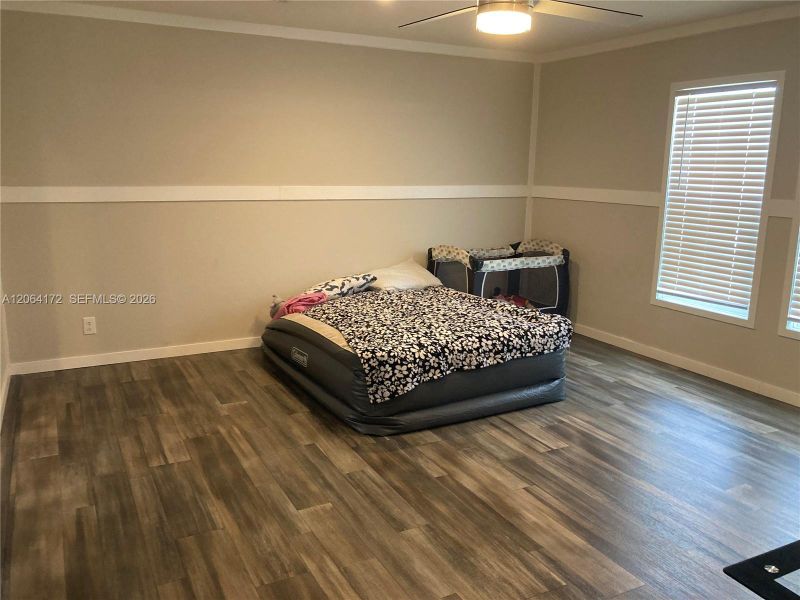 Furnished interior view inside a new home in , Clewiston (Image 10).