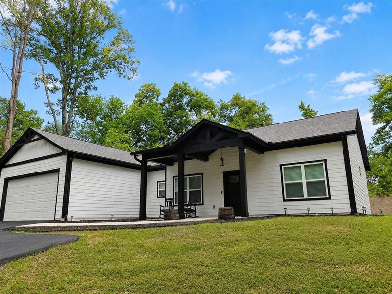 Exterior details and patio area of a home in , Dahlonega (Image 24).