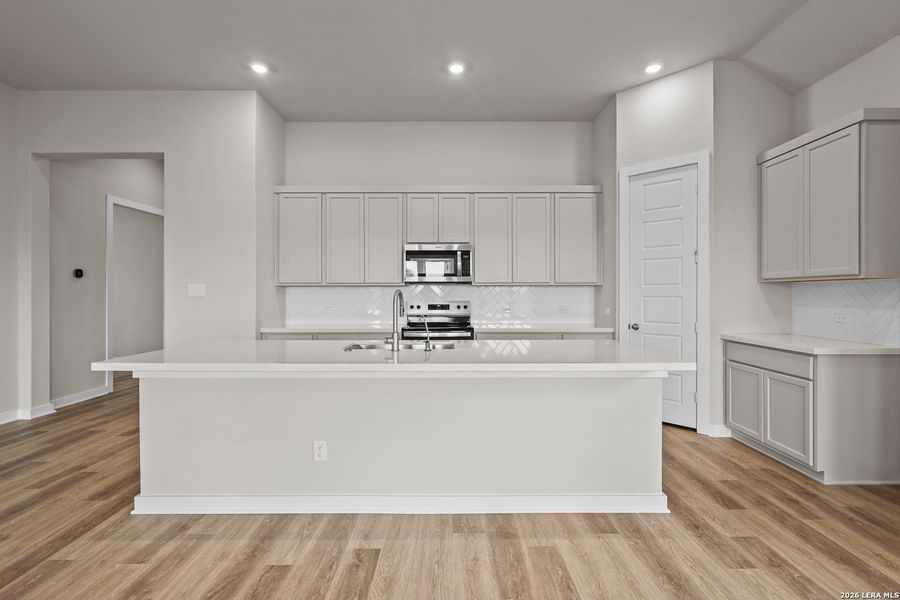 Furnished interior view inside a new home in Megan's Landing, Castroville (Image 7).