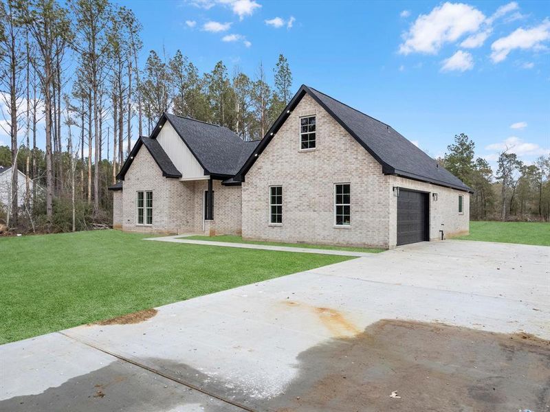 Step into this charming modern farmhouse with its inviting white brick exterior. The oversized windows, under soffit lighting add both style and functionality to this beauty!