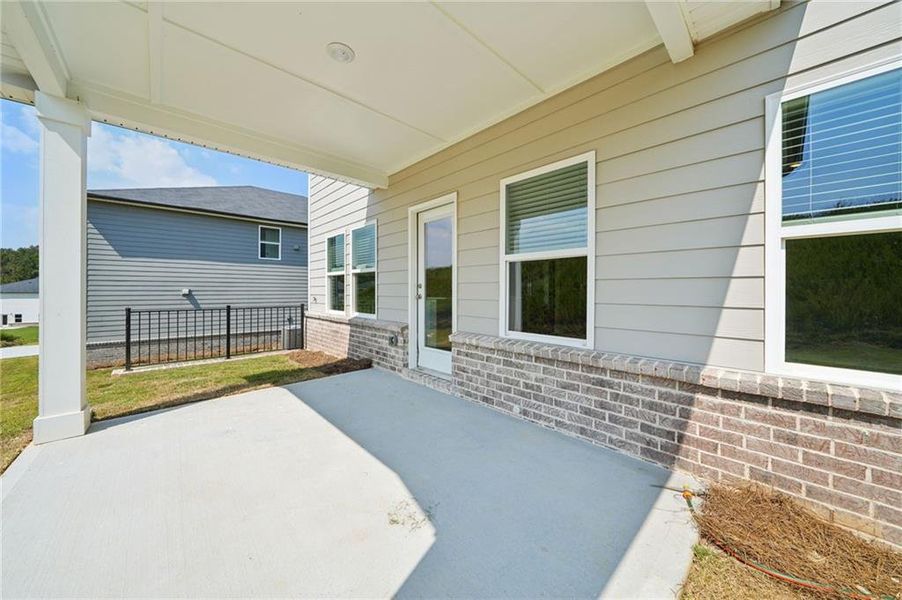 Exterior details and patio area of a home in Preserve at Mountain Creek, Pendergrass (Image 20).