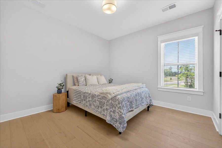 Furnished interior view inside a new home in Tidewater at Lakes of Cane Bay, Summerville (Image 38).