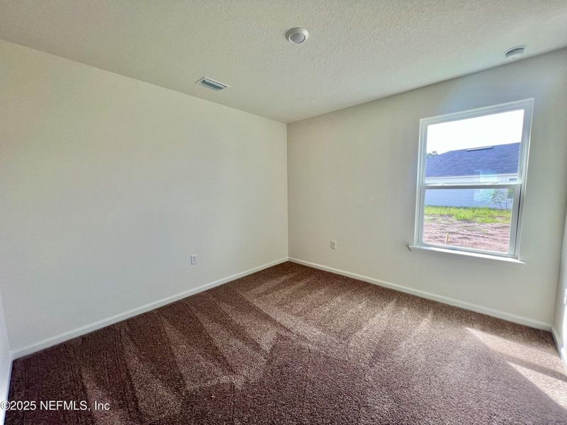 Spacious, unfurnished interior of a new home in Panther Creek, Jacksonville (Image 4).