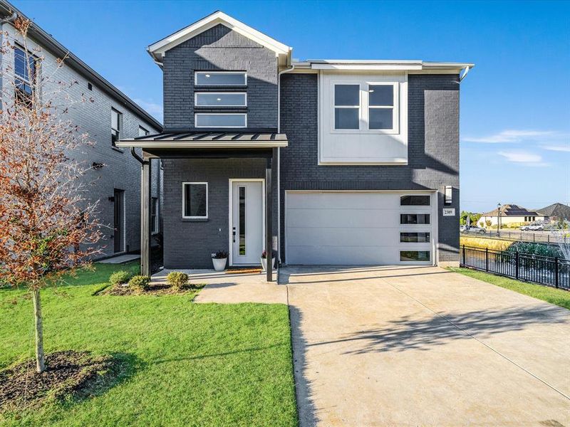 Exterior details and patio area of a home in , Little Elm (Image 19). Exterior details and patio area of a home in , Little Elm (Image 19).