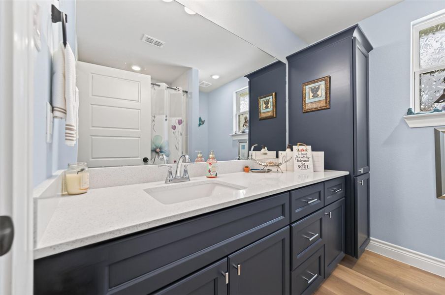 This secondary full bathroom conveniently situated at the front of the house and between 2 bedrooms. The space has been thoughtfully designed with contemporary, high-quality fixtures and beautifully updated tiling throughout. The window allow for an abundance of natural light to fill the room, creating an inviting and refreshing atmosphere that is perfectly suited for both guests and daily family use. This secondary full bathroom conveniently situated at the front of the house and between 2 bedrooms. The space has been thoughtfully designed with contemporary, high-quality fixtures and beautifully updated tiling throughout. The window allow for an abundance of natural light to fill the room, creating an inviting and refreshing atmosphere that is perfectly suited for both guests and daily family use.