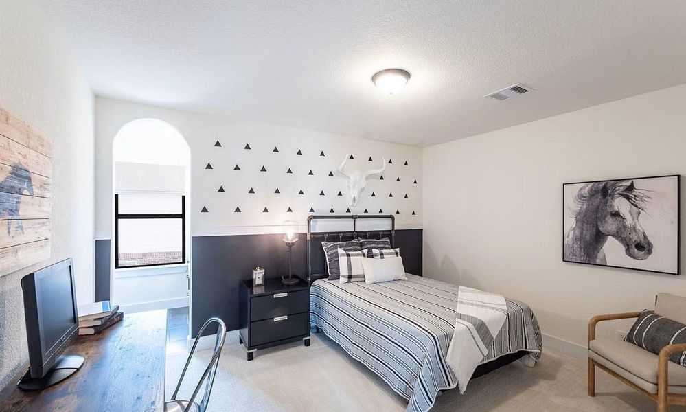 Comfortable secondary bedroom with a bright layout and versatile space, perfect for family members, guests, or a home office setup. **Photos are representative only and may vary as built.**
