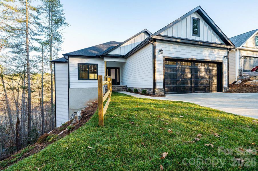 Front exterior of a new home in , Lenoir, NC, highlighting curb appeal (Image 21).