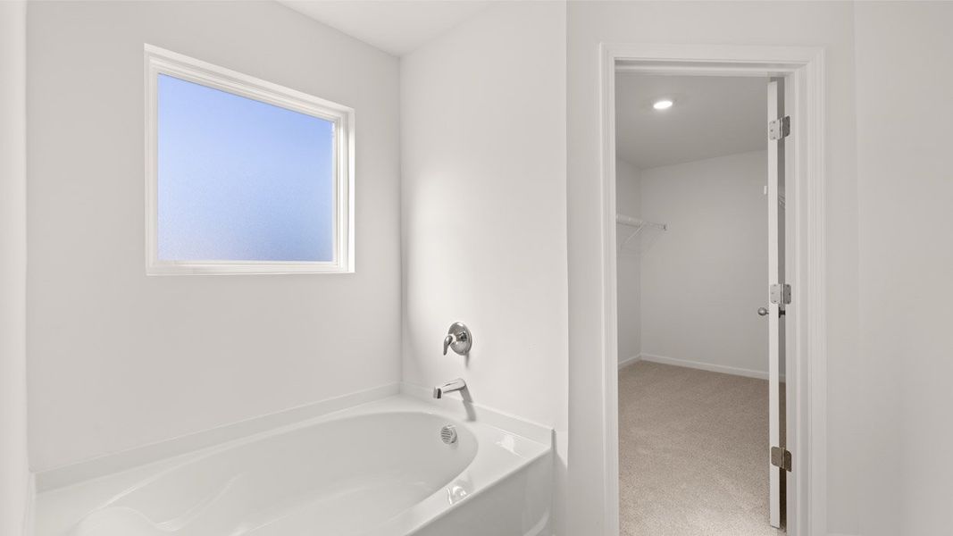 Representative unfurnished interior of a home built from the Mansfield by D.R. Horton in Brooks Station, Dacula (Image 22).