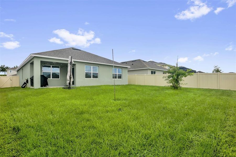 Exterior details and patio area of a home in Timberwalk, Mount Dora (Image 3).