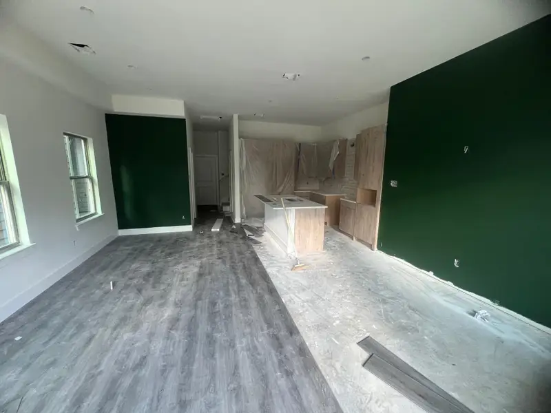 Another view of the stunning accent wall and kitchen. Another view of the stunning accent wall and kitchen.