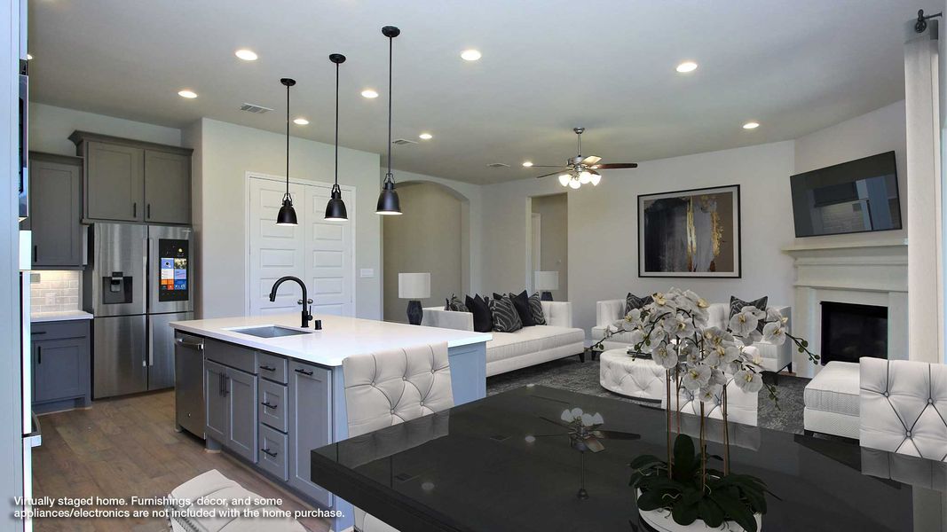 Representative furnished interior of a home built from the 2737M by Perry Homes in Lakes of Cane Island, Katy (Image 5).