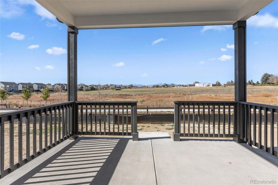 Exterior details and patio area of a home in Highlands Preserve, Mead (Image 3).