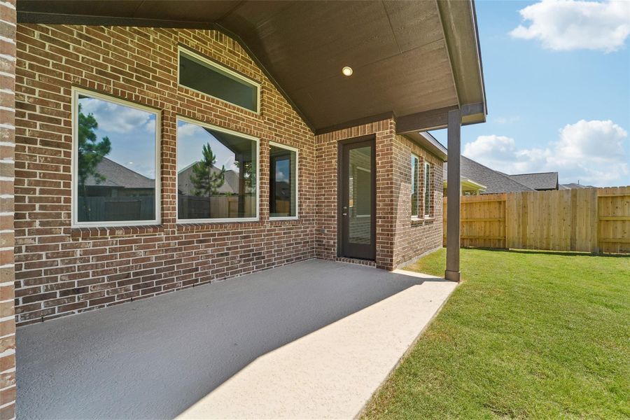 Exterior details and patio area of a home in Evergreen 55', Conroe (Image 2). Exterior details and patio area of a home in Evergreen 55', Conroe (Image 2).