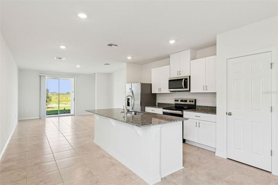 Furnished interior view inside a new home in Springs at Lake Alfred - Classic Series, Lake Alfred (Image 5).
