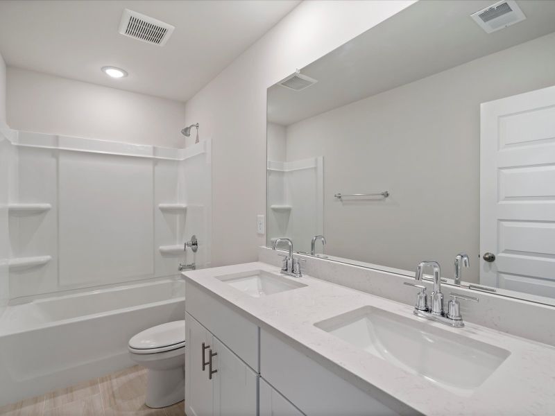 Furnished interior view inside a new home in Vickery Station, Woodruff (Image 8).