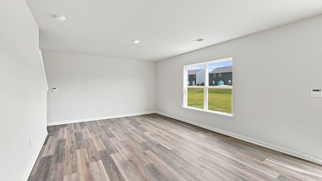 Spacious, unfurnished interior of a new home in Bentley Park, Greenwood (Image 17).