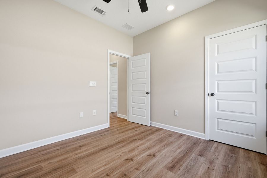 Spacious, unfurnished interior of a new home in Southern Charm, Crestview (Image 21).