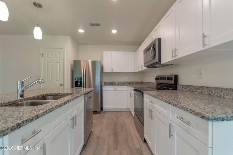 Furnished interior view inside a new home in , Jacksonville (Image 16).