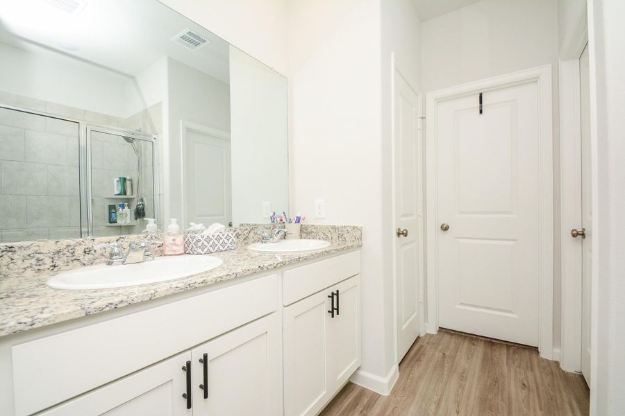 Furnished interior view inside a new home in Granger Pines, Conroe (Image 31).