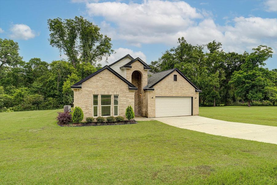 Front exterior of a new home in , Kenefick, TX, highlighting curb appeal (Image 21).