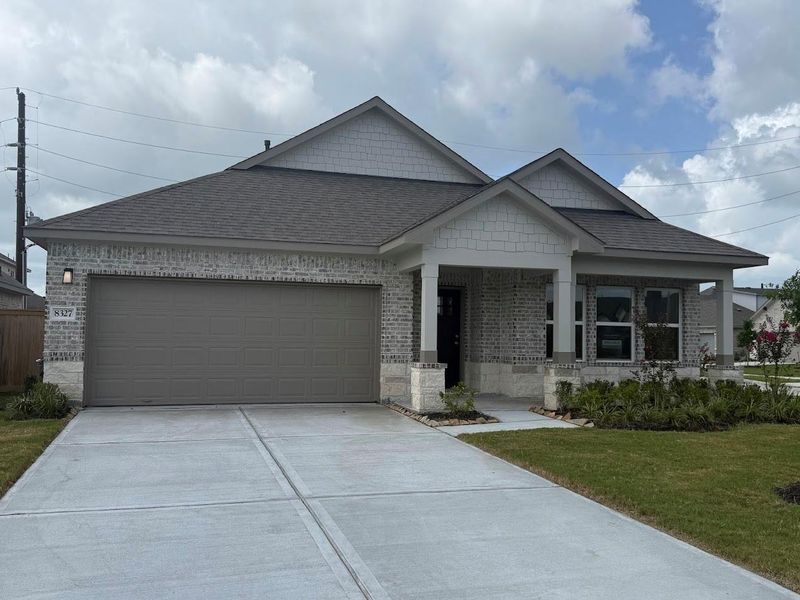 Front exterior of a new home in Ashland, Angleton, TX, highlighting curb appeal (Image 1). Front exterior of a new home in Ashland, Angleton, TX, highlighting curb appeal (Image 1).