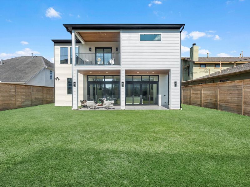 Enjoy this substantial yard, with sprinklers,  of this stunning new build home.