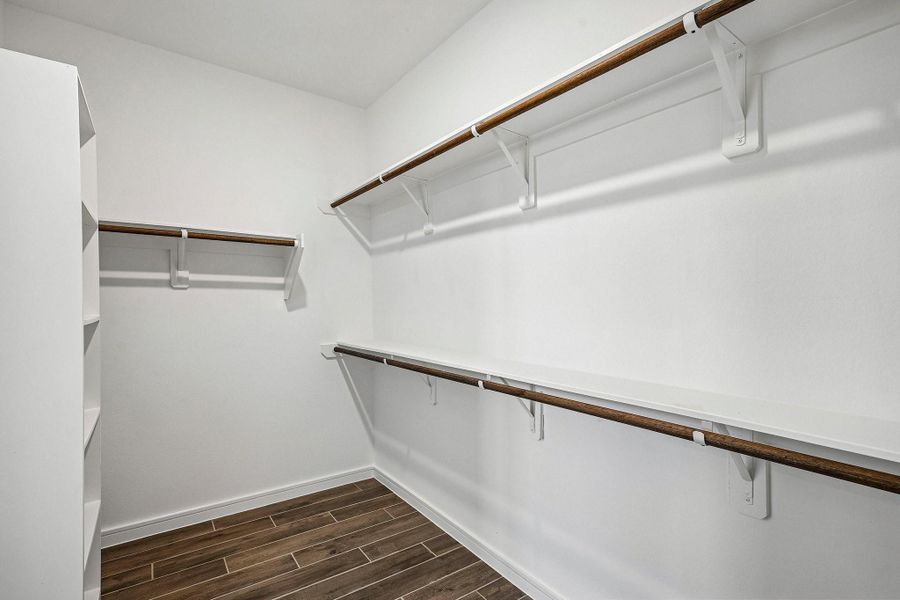 Primary walk-in closet Primary walk-in closet
