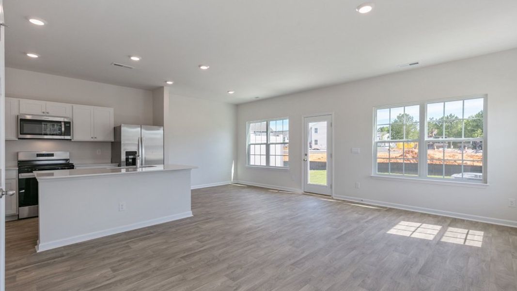Spacious, unfurnished interior of a new home in The Townes at Matthews Landing, Fuquay Varina (Image 11). Spacious, unfurnished interior of a new home in The Townes at Matthews Landing, Fuquay Varina (Image 11).