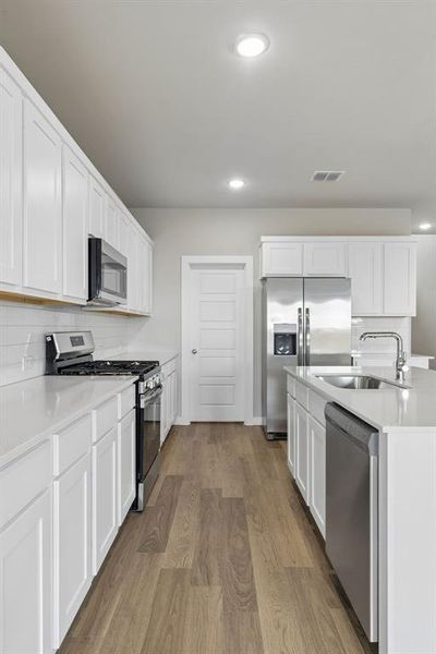 Kitchen in the Winters home plan by Trophy Signature Homes – REPRESENTATIVE PHOTO