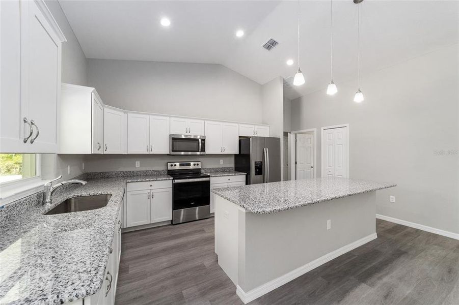 Furnished interior view inside a new home in , Dunnellon (Image 8).