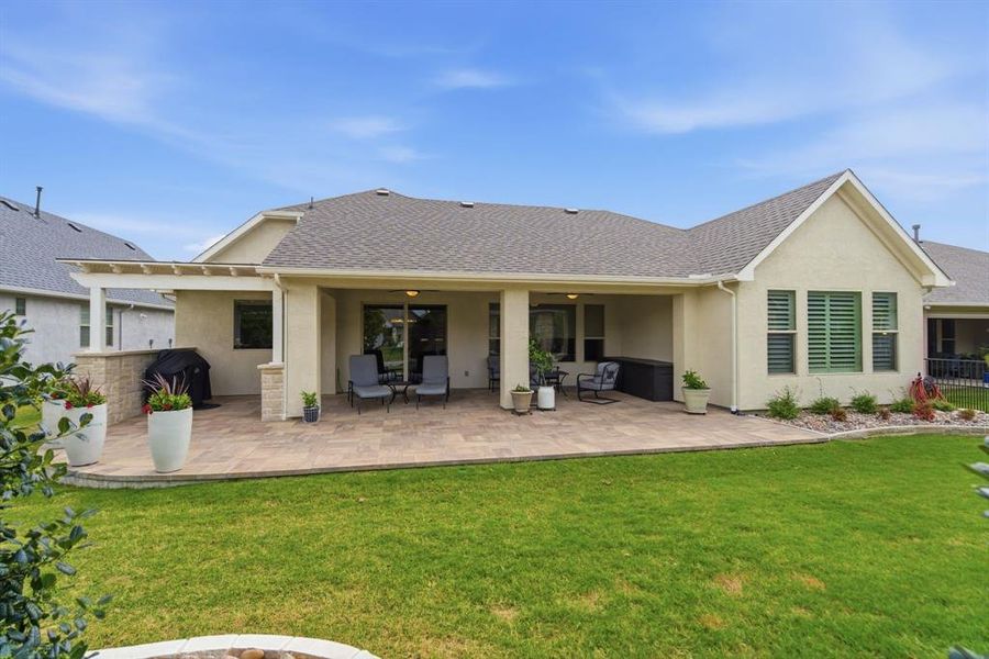 Exterior details and patio area of a home in , Denton (Image 3).