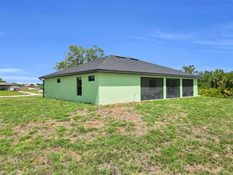 Front exterior of a new home in , Labelle, FL, highlighting curb appeal (Image 1). Front exterior of a new home in , Labelle, FL, highlighting curb appeal (Image 1).
