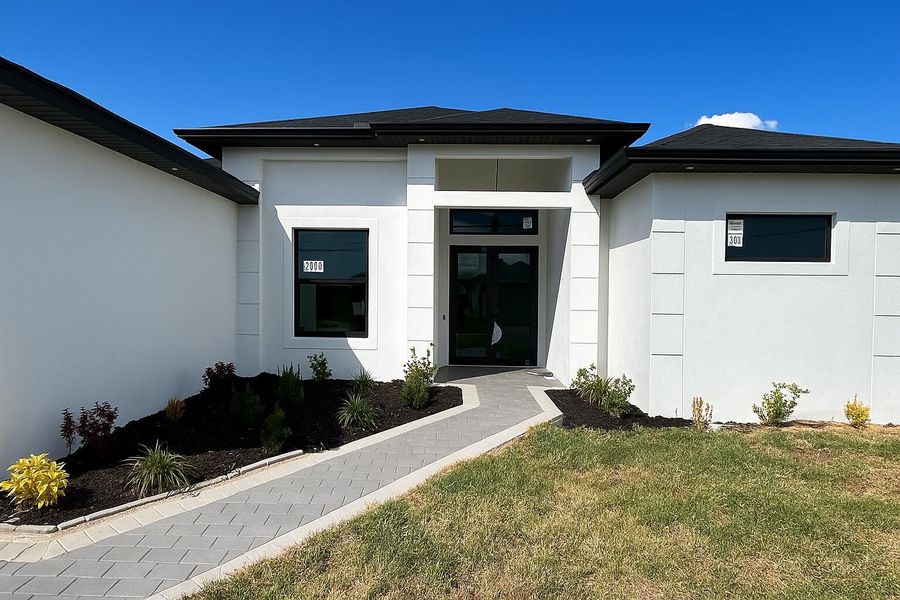 Exterior details and patio area of a home in , Cape Coral (Image 2). Exterior details and patio area of a home in , Cape Coral (Image 2).