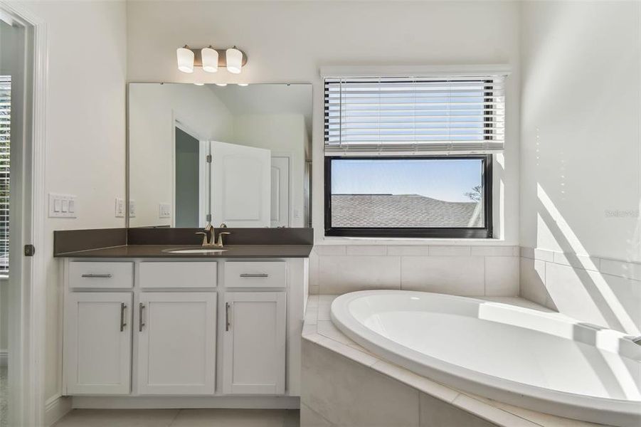 Photos are not the home listed, but same floor plan.