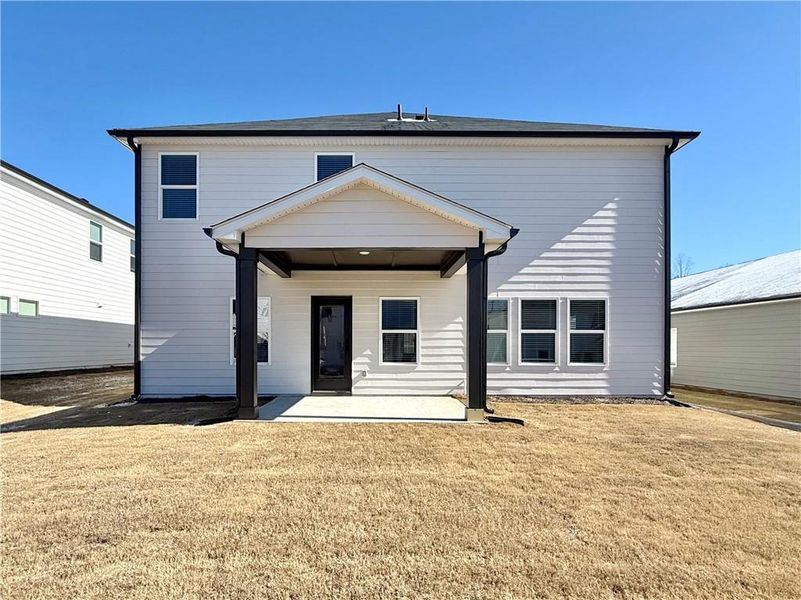 Exterior details and patio area of a home in Vines at Mill Creek - Estate Series, Braselton (Image 20).