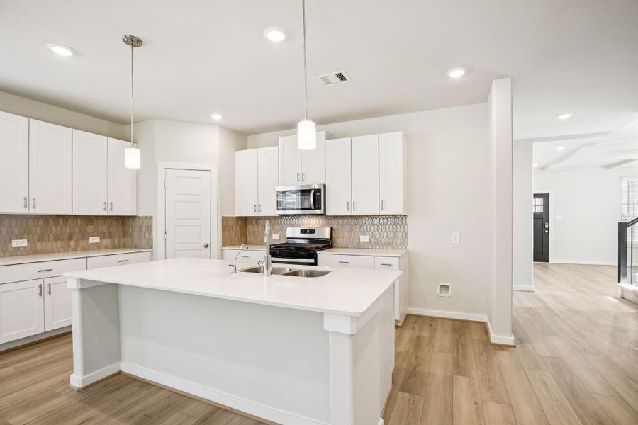 Photo is not of the actual home, but is an inspirational photo of builder’s model home and may depict options, furnishings, and/or decorator features that are not included.