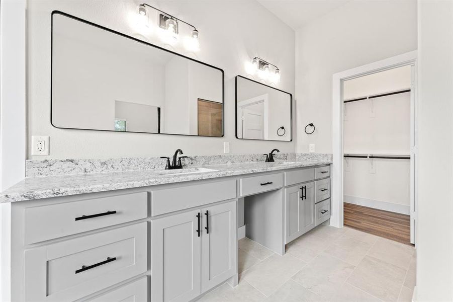 Bathroom featuring vanity and hardwood / wood-style flooring