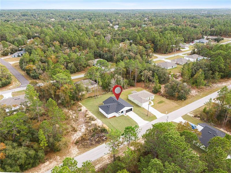 Front exterior of a new home in , Citrus Springs, FL, highlighting curb appeal (Image 28). Front exterior of a new home in , Citrus Springs, FL, highlighting curb appeal (Image 28).
