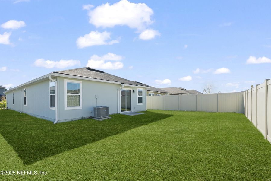 Exterior details and patio area of a home in The Arbors, Jacksonville (Image 2). Exterior details and patio area of a home in The Arbors, Jacksonville (Image 2).