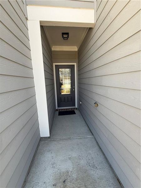 Exterior details and patio area of a home in Somerset at Riverbrook, Gainesville (Image 3).