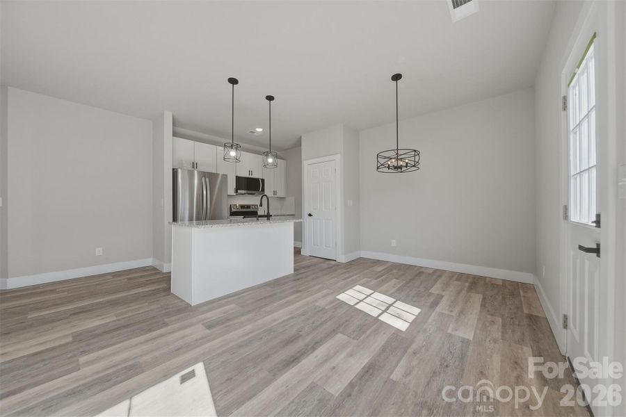 Living Area looking into Kitchen