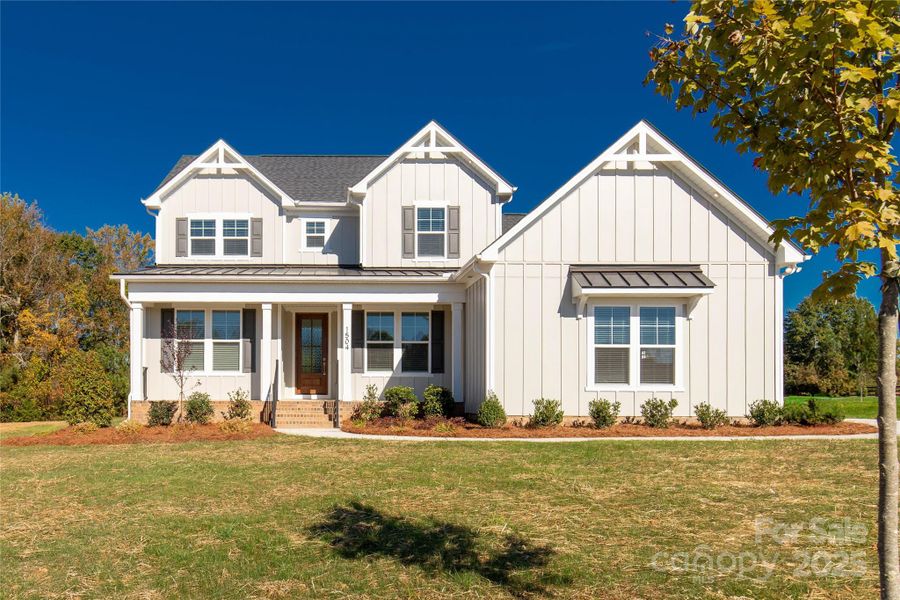 Front exterior of a new home in , Gastonia, NC, highlighting curb appeal (Image 17).